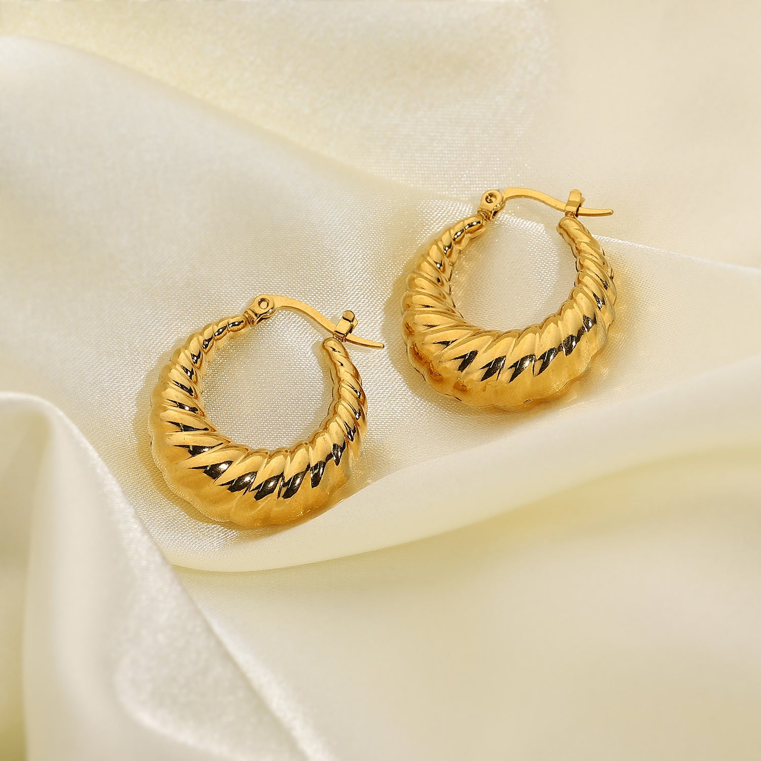 chunky gold oval hoops styling shot PVD coated