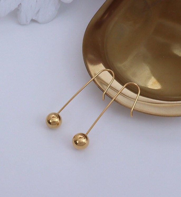 titanium steel long teardrop drop earrings close up