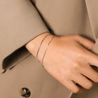 gold herringbone snake chain bracelet texture detail