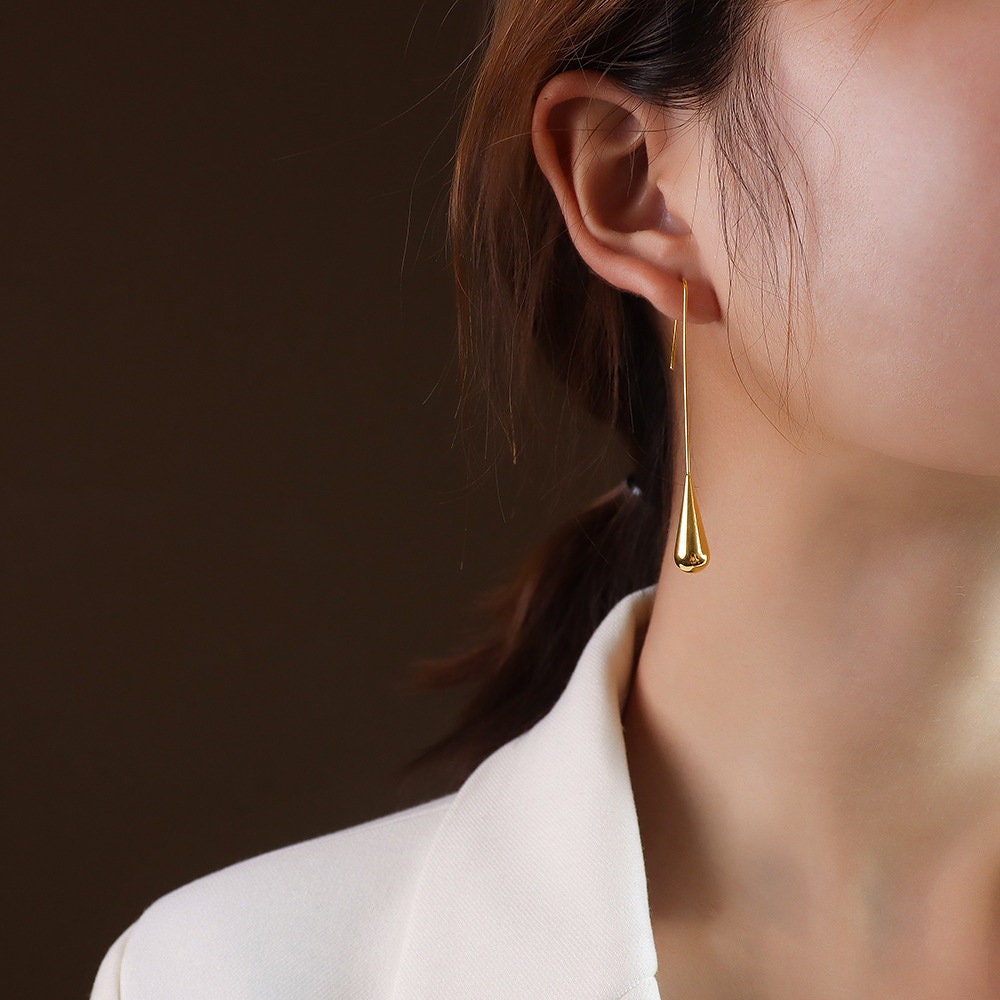rose gold long teardrop earrings detail shot