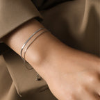 snake chain gold bracelet styling close up