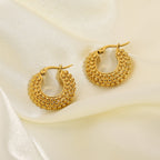 large gold hoop earrings open airy design detail