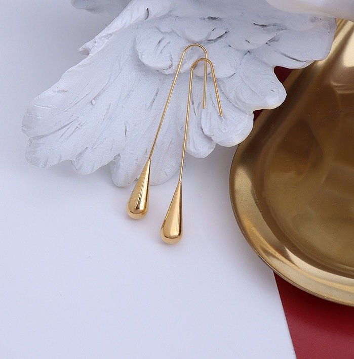 gold 6cm teardrop earrings close up detail
