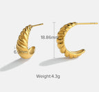 croissant hoop earrings close up ridged texture detail